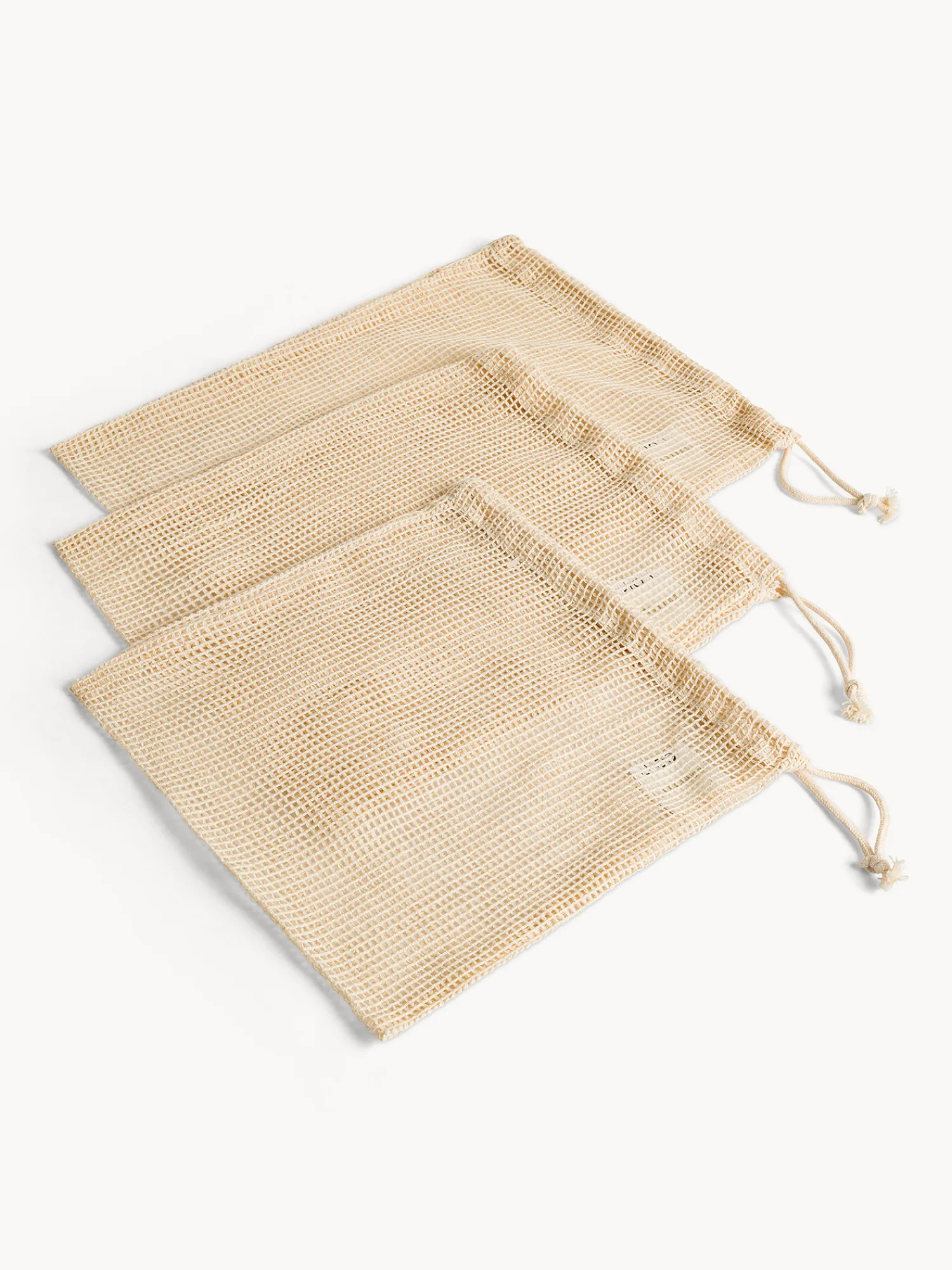 coincasa Set 3 sacchetti a rete in puro cotone con laccio regolabili